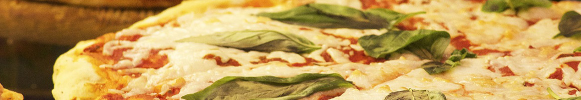 Eating Italian Pizza at Niki's Italian Bistro restaurant in North Richland Hills, TX.